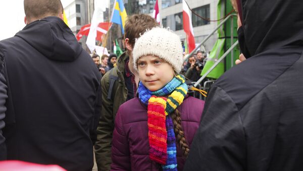 Swedish climate activist Greta Thunberg, centre, takes part in a climate change protest in Brussels, Friday, March 6, 2020 - Sputnik International