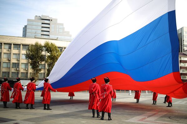 Russian Kuban Cossacks perform a flag-raising ceremony on National Unity Day in Krasnodar, 4 November 2020.  - Sputnik International