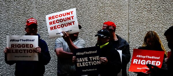 Supporters of U.S. President Donald Trump hold placards at a Stop the Steal protest outside Milwaukee Central Count the day after all of Milwaukee County’s absentee ballots were counted, in Milwaukee, Wisconsin, U.S. November 5, 2020. Supporters of U.S. President Donald Trump hold placards at a Stop the Steal protest outside Milwaukee Central Count the day after all of Milwaukee County’s absentee ballots were counted, in Milwaukee, Wisconsin, U.S. November 5, 2020. - Sputnik International