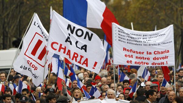 People take part in a demonstration against Islamic extremism, in Paris, file photo. - Sputnik International