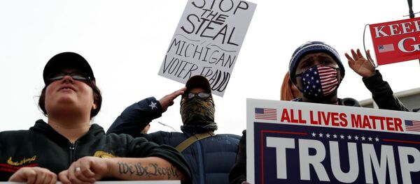 Supporters of U.S. president Donald Trump rally as votes continue to be counted following the 2020 U.S. presidential election, in Detroit, Michigan, U.S., November 5, 2020.   - Sputnik International