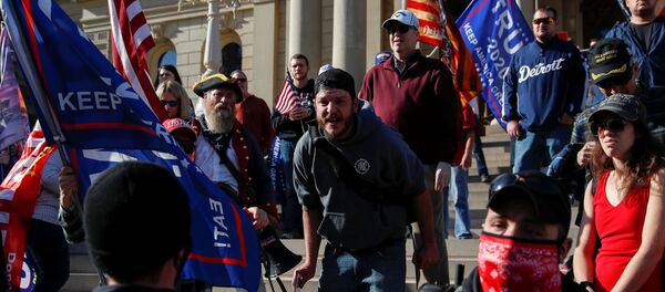Supporters of U.S. President Donald Trump rally outside the State Capitol building as votes continue to be counted following the 2020 U.S. presidential election, in Lansing Supporters of U.S. President Donald Trump rally outside the State Capitol building as votes continue to be counted following the 2020 U.S. presidential election, in Lansing - Sputnik International