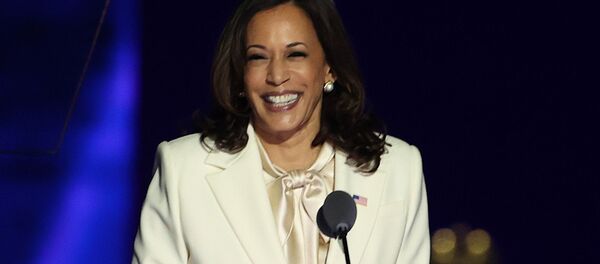 WILMINGTON, DELAWARE - NOVEMBER 07: Vice President-elect Kamala Harris takes the stage before President-elect Biden addresses the nation from the Chase Center November 07, 2020 in Wilmington, Delaware.  - Sputnik International