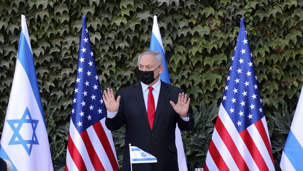 Israeli Prime Minister Benjamin Netanyahu attends a ceremony to sign amendments to a series of scientific cooperation agreements with U.S. Ambassador to Israel David Friedman, at Ariel University, in the West Bank settlement of Ariel, Wednesday, Oct. 28, 2020.  - Sputnik International