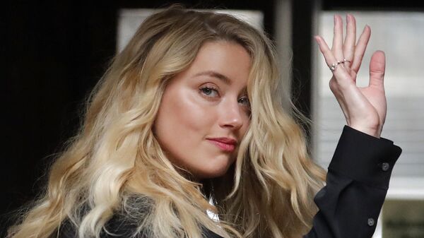 US Actress Amber Heard, former wife of actor Johnny Depp, arrives at the High Court in London, Tuesday, July 28, 2020.  - Sputnik International