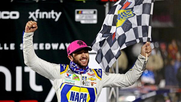 Nov 1, 2020; Martinsville, VA, USA; NASCAR Cup Series driver Chase Elliott (9) celebrates winning the Xfinity 500 at Martinsville Speedway.  - Sputnik International