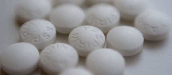This Thursday, Aug. 23, 2018 file photo shows an arrangement of aspirin pills in New York. A new study suggests millions of people need to rethink their use of aspirin to prevent a heart attack. If you've already had a heart attack, doctors recommend taking a low-dose aspirin a day to prevent a second one. But if you don't yet have heart disease, doctors now advise routine aspirin can do more harm than good. - Sputnik International