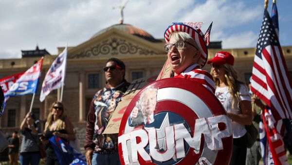 Supporters of US President Donald Trump gather at a “Stop the Steal” protest after the 2020 US presidential election was called for Democratic candidate Joe Biden, in front of the Arizona State Capitol in Phoenix, Arizona, US, November 7, 2020 - Sputnik International