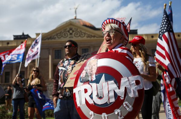 Supporters of US President Donald Trump gather at a “Stop the Steal” protest after the 2020 US presidential election was called for Democratic candidate Joe Biden, in front of the Arizona State Capitol in Phoenix, Arizona, US, November 7, 2020 - Sputnik International