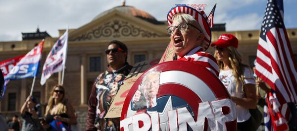 Supporters of US President Donald Trump gather at a “Stop the Steal” protest after the 2020 US presidential election was called for Democrat candidate Joe Biden, in front of the Arizona State Capitol in Phoenix, Arizona, US, 7 November 2020. - Sputnik International