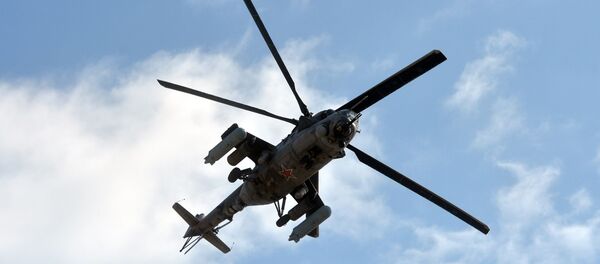 Russian military helicopter Mi-24 (NATO reporting name: Hind) seen during the Kavkaz-2020 war games. - Sputnik International