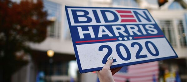 Supporters of President-elect Joe Biden shout across the street towards supporters of U.S. President Donald Trump, the day after a presidential election victory was called for Biden, in Philadelphia, Pennsylvania, U.S. November 8, 2020. REUTERS/Mark Makela - Sputnik International
