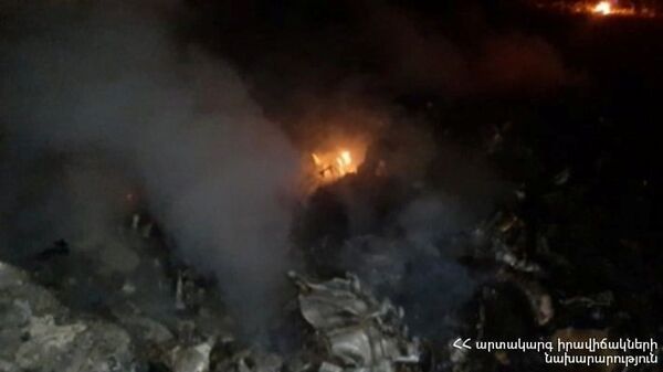 A view shows what is said to be a crash site following the downing of a Russian military Mi-24 helicopter at an unknown location in Armenia, in this handout photo released November 9, 2020. Ministry of Emergency Situations of the Republic of Armenia - Sputnik International