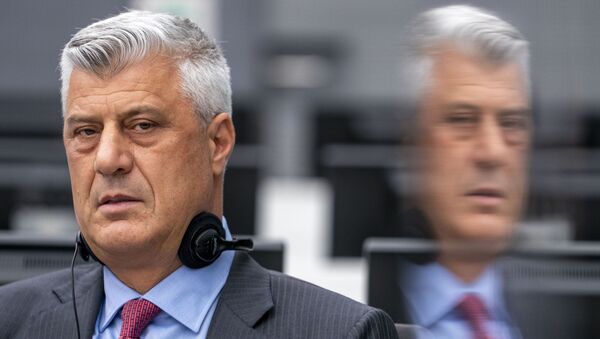 Kosovar former president Hashim Thaci sits for the first time before a war crimes court in The Hague on November 9, 2020, to face charges relating to the 1990s conflict with Serbia. - The one-time guerrilla leader, 52, who resigned as president last week, wore a grey suit and red tie for the hearing at the Kosovo Specialist Chambers in the Dutch city. - Sputnik International