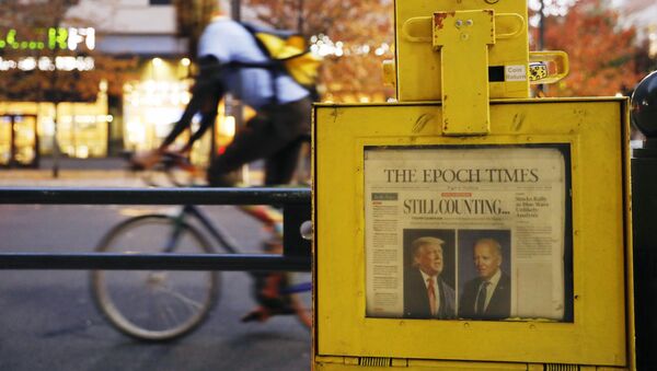 A newspaper from Thursday, Nov. 5 sits in a street box outside the Pennsylvania Convention Center in Philadelphia, where a handful of supporters of President Donald Trump continue to protest Monday, Nov. 9, 2020, two days after the election was called for Democrat Joe Biden. - Sputnik International