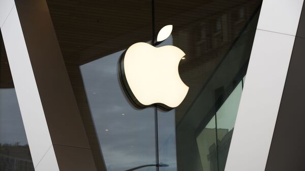 This Saturday, March 14, 2020 file photo shows an Apple logo on the facade of the downtown Brooklyn Apple store in New York. On Tuesday, Nov. 10, 2020 - Sputnik International