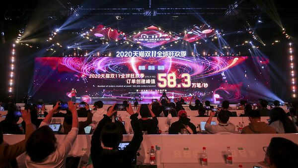 A screen shows sales information during the 2020 Tmall Global Shopping Festival on Singles' Day, also known as the Double 11 shopping festival, at a media centre in Hangzhou, in eastern China's Zhejiang province on 11 November 2020. - Sputnik International