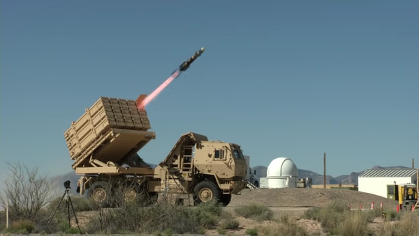 A Longbow Hellfire Missile is test-fired from a Multi Mission Launcher (MML) at White Sands Missile Range in New Mexico. - Sputnik International