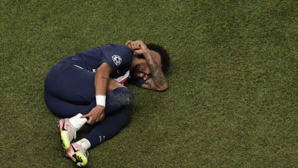 In this Sunday, Aug. 23, 2020 file photo, PSG's Neymar lies on the ground during the Champions League final soccer match between Paris Saint-Germain and Bayern Munich at the Luz stadium in Lisbon, Portugal - Sputnik International
