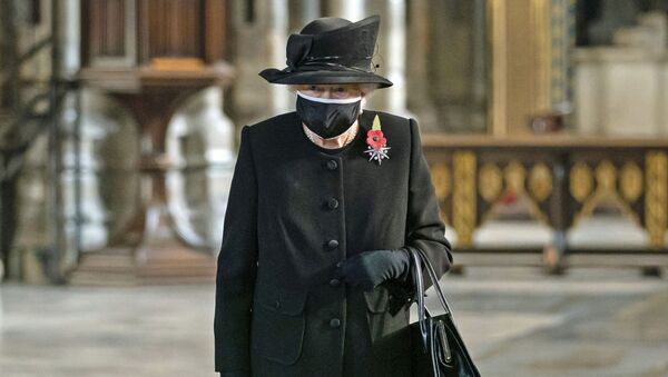 Britain's Queen Elizabeth II attends a ceremony to mark the centenary of the burial of the Unknown Warrior, in Westminster Abbey, London, 4 November 2020 - Sputnik International