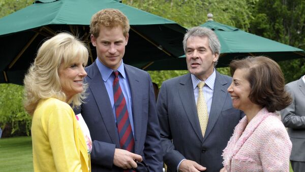 Britain's Prince Harry talks with Dr. Jill Biden, left, and British Ambassador Sir Peter Westmacott, second from right, and his wife Susie Nemazee, right, during a reception at the British Ambassador's Residence in Washington, Monday, May 7, 2012 - Sputnik International