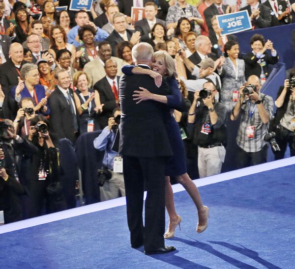 Vice-president Joe Biden, left, is hugged by wife Jill, right, on stage at the Democrat National Convention in Charlotte, North Carolina, Thursday, 6 September 2012. - Sputnik International