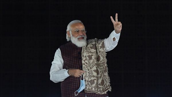 India's Prime Minister Narendra Modi gestures during the celebrations after the victory in Bihar assembly election and by-election in other states at the Bharatiya Janata Party (BJP) headquarters in New Delhi on 11 November 2020. - Sputnik International