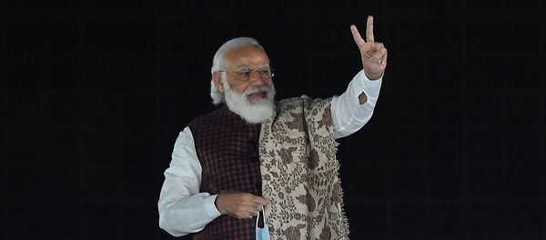 India's Prime Minister Narendra Modi gestures during the celebrations after the victory in Bihar assembly election and by-election in other states at the Bharatiya Janata Party (BJP) headquarters in New Delhi on November 11, 2020 - Sputnik International