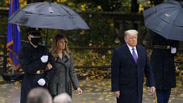 President Donald Trump and first lady Melania Trump observe Veterans' Day at Arlington National Cemetery in Arlington, Virginia, Wednesday, 11 November 2020. - Sputnik International