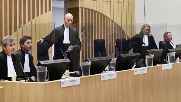 Judge Hendrik Steenhuis arrives to attend the hearing in trial of the Malaysia Airlines flight MH17 on September 28, 2020 in the high-security courtroom of the Schiphol Judicial Complex, in Badhoevedorp, where the lawsuit about the downing of flight MH17 continues.  - Sputnik International