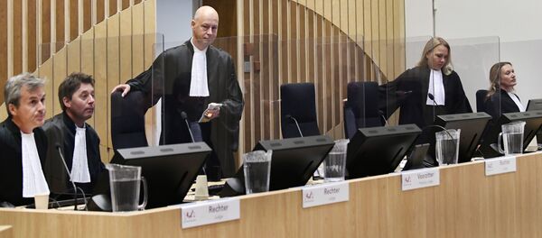 Judge Hendrik Steenhuis arrives to attend the hearing in trial of the Malaysia Airlines flight MH17 on September 28, 2020 in the high-security courtroom of the Schiphol Judicial Complex, in Badhoevedorp, where the lawsuit about the downing of flight MH17 continues. Judge Hendrik Steenhuis arrives to attend the hearing in trial of the Malaysia Airlines flight MH17 on September 28, 2020 in the high-security courtroom of the Schiphol Judicial Complex, in Badhoevedorp, where the lawsuit about the downing of flight MH17 continues. - Sputnik International