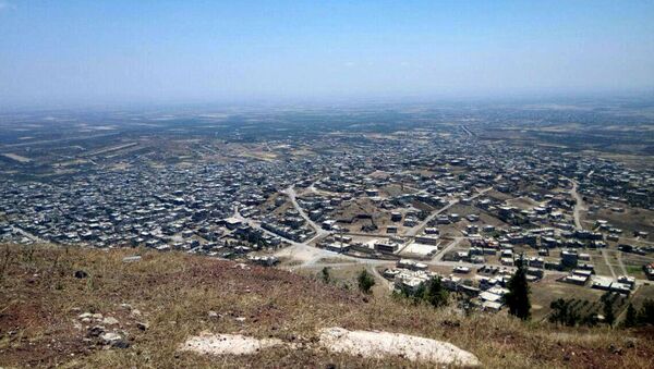 This photo released Tuesday, July 17, 2018, by the Syrian official news agency SANA, shows a general view of Tell al-Haara, from the highest hill in the southwestern Daraa province, Syria. - Sputnik International