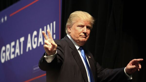 Republican presidential nominee Donald Trump gestures after speaking at a campaign rally inside the Cabarrus Arena 7 Events Center in Concord, North Carolina on November 3, 2016 - Sputnik International
