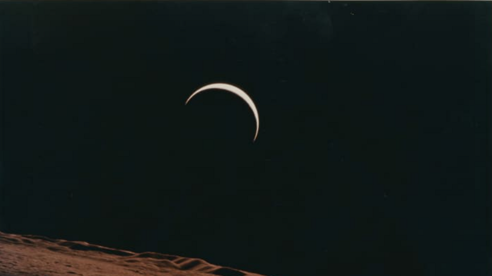 Crescent Earth rising beyond the Moon's barren horizon, 1971.  - Sputnik International, 1920, 22.02.2022