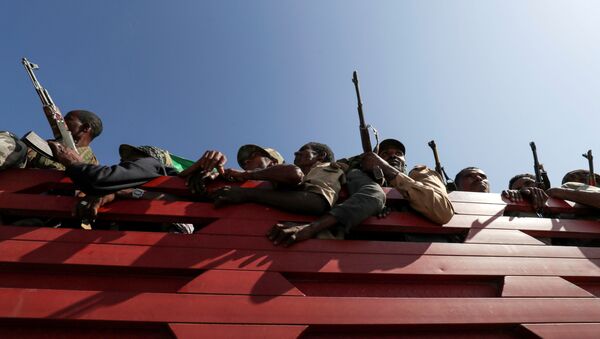 FILE PHOTO: Members of Amhara region militias ride on their truck as they head to the mission to face the Tigray People's Liberation Front (TPLF), in Sanja, Amhara region near a border with Tigray, Ethiopia November 9, 2020. - Sputnik International