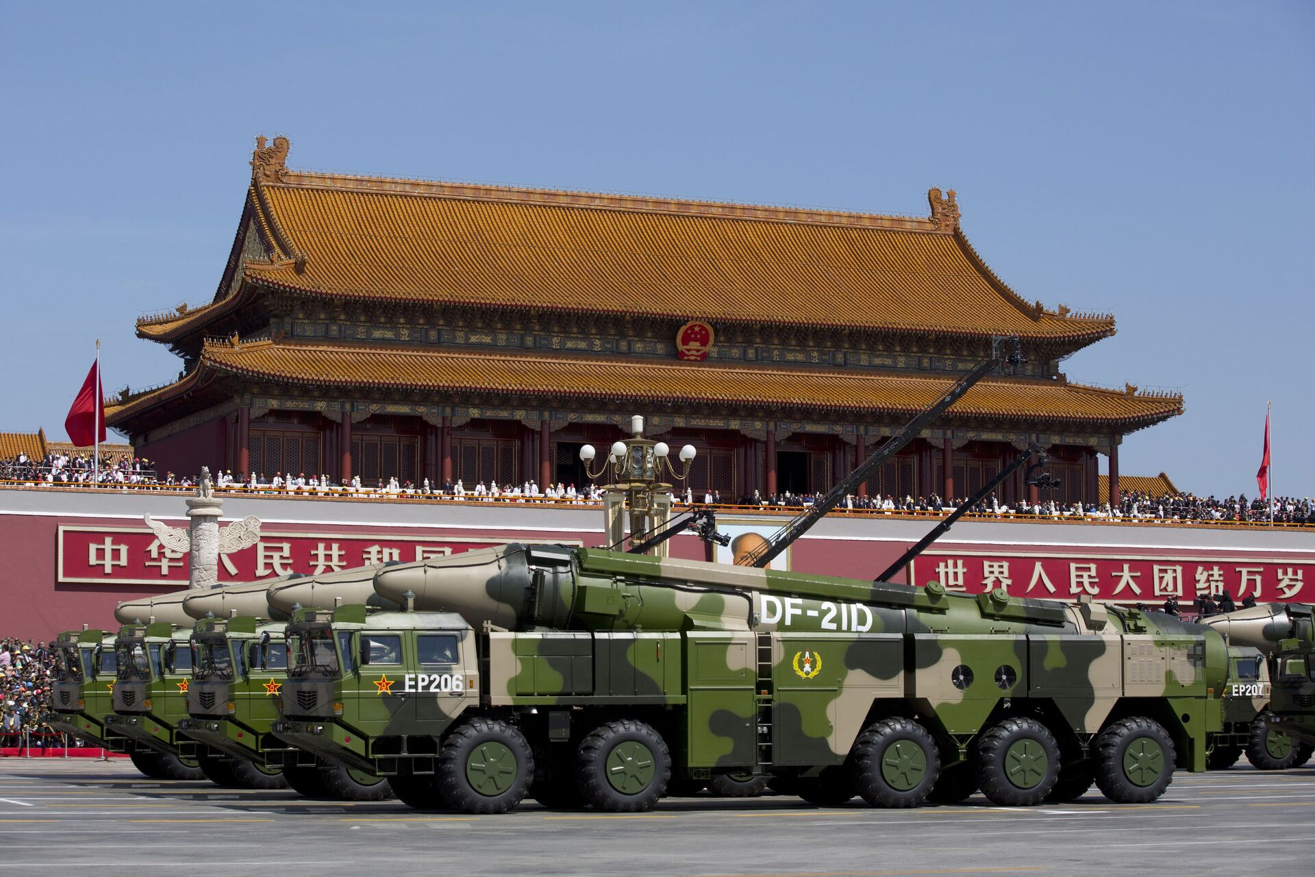 In this Sept. 3, 2015, file photo, Chinese military vehicles carrying DF-21D anti-ship ballistic missiles, potentially capable of sinking a U.S. Nimitz-class aircraft carrier in a single strike, pass by Tiananmen Gate during a military parade to commemorate the 70th anniversary of the end of World War II, in Beijing. China’s military test-fired two missiles into the South China Sea, including a “carrier killer” military analysts suggest might have been developed to attack U.S. forces, a newspaper reported Thursday, Aug. 27, 2020. - Sputnik International, 1920, 07.06.2022