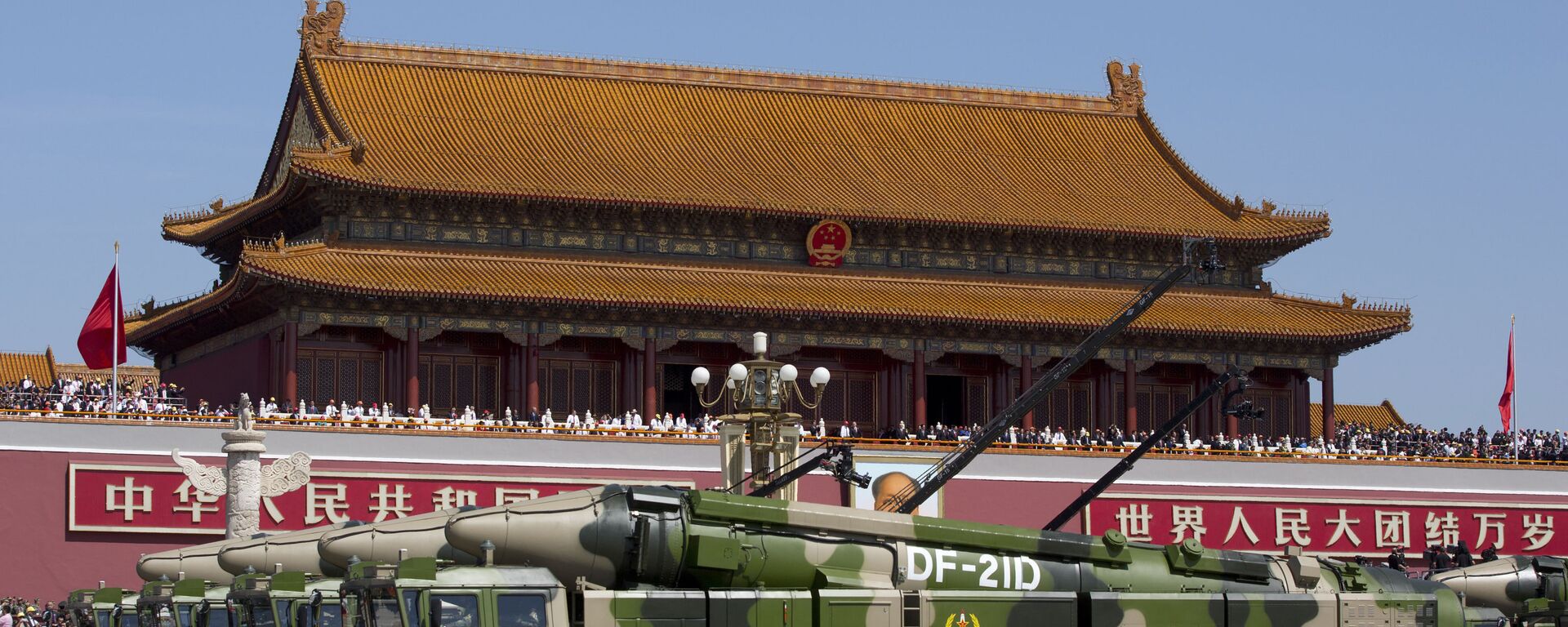 In this Sept. 3, 2015, file photo, Chinese military vehicles carrying DF-21D anti-ship ballistic missiles, potentially capable of sinking a U.S. Nimitz-class aircraft carrier in a single strike, pass by Tiananmen Gate during a military parade to commemorate the 70th anniversary of the end of World War II, in Beijing. China’s military test-fired two missiles into the South China Sea, including a “carrier killer” military analysts suggest might have been developed to attack U.S. forces, a newspaper reported Thursday, Aug. 27, 2020. - Sputnik International, 1920, 16.11.2020
