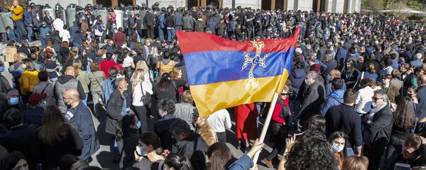 Protesters wave an Armenian national flag during a protest against an agreement to halt fighting over the Nagorno-Karabakh region, in Yerevan, Armenia, Wednesday, Nov. 11, 2020. Protesters wave an Armenian national flag during a protest against an agreement to halt fighting over the Nagorno-Karabakh region, in Yerevan, Armenia, Wednesday, Nov. 11, 2020. - Sputnik International