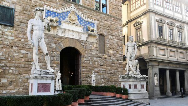 Copy of Michelangelo's David is seen at the entrance of Palazzo Vecchio  in Florence, Italy. File photo - Sputnik International