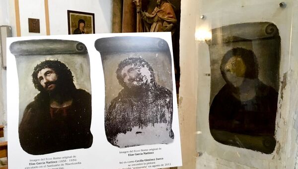 View of the deteriorated version of 'Ecce Homo' mural by 19th century painter Elias Garcia Martinez, right, next to a copy of the original, left, at the Borja Church in Zaragoza, Spain, Wednesday, March 16, 2016. More than three years after a botched fresco restoration by an octogenarian painter became a major tourist attraction for the northern Spanish town of Borja, local officials are looking to inject new life into the phenomenon with the opening Wednesday of a new information center that documents the fresco's success and aims to attract more visitors. - Sputnik International