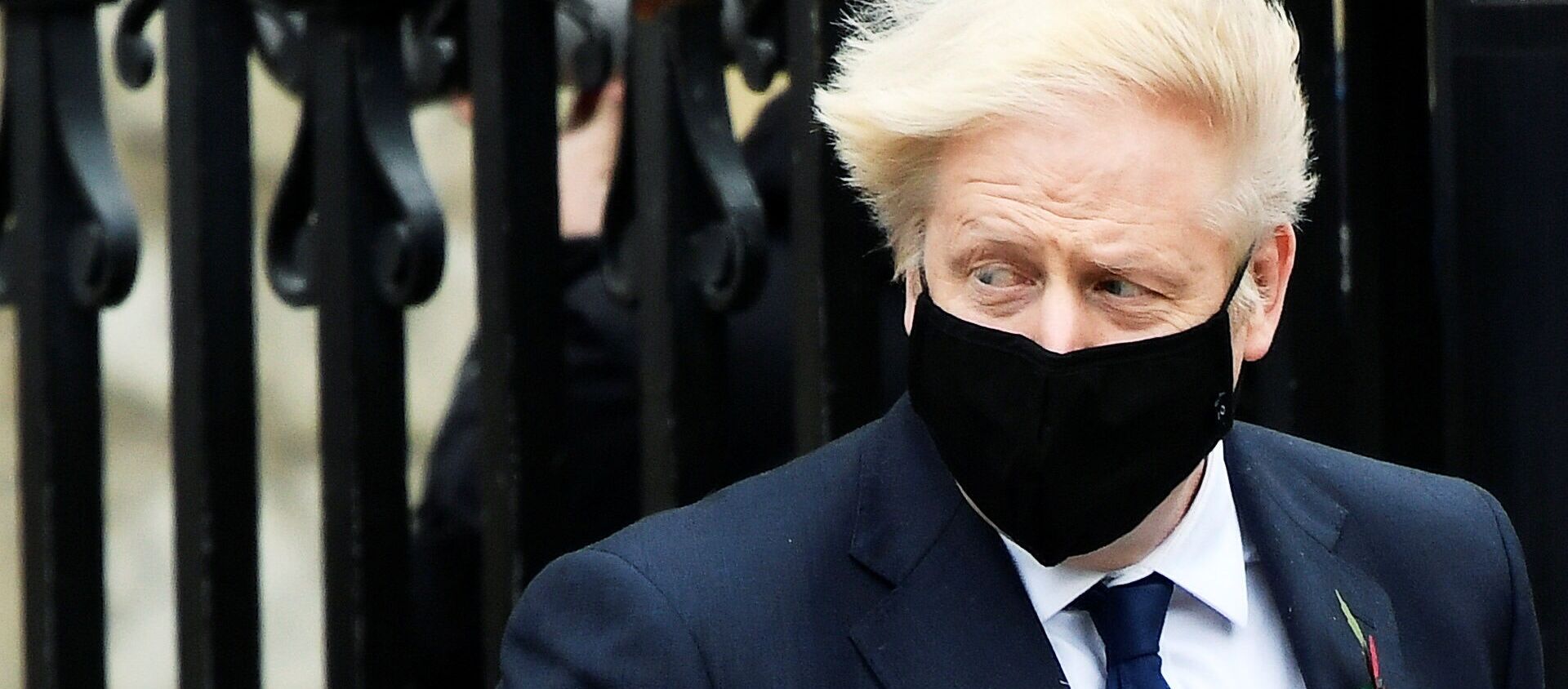 Britain's Prime Minister Boris Johnson wearing a face mask leaves the Westminster Abbey following a remembrance service on Armistice Day in London, Britain, November 11, 2020. - Sputnik International, 1920, 21.11.2020