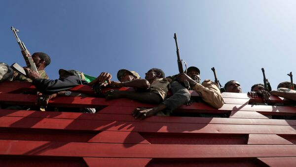 FILE PHOTO: Members of Amhara region militias ride on their truck as they head to the mission to face the Tigray People's Liberation Front (TPLF), in Sanja, Amhara region near a border with Tigray, Ethiopia November 9, 2020 - Sputnik International