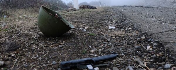 Helmet on the side of the road in Nagorno-Karabakh Helmet on the side of the road in Nagorno-Karabakh - Sputnik International