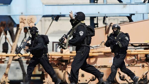 Israeli special forces police officers run during a drill simulating an attack on a bus, in the port of Ashdod, Israel (File) - Sputnik International