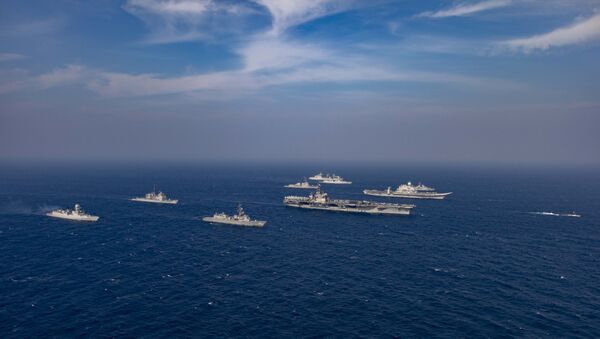 This handout photo taken and released by the Indian Navy on November 17, 2020 shows a ships taking part in the second phase of the Malabar naval exercise in the Arabian sea. - India, Australia, Japan and the United States started the second phase of a strategic navy drill on November 17 in the Northern Arabian sea. - Sputnik International
