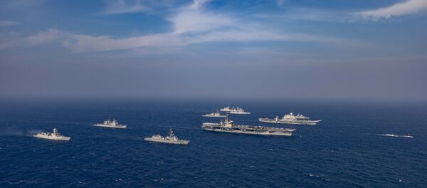 This handout photo taken and released by the Indian Navy on November 17, 2020 shows a ships taking part in the second phase of the Malabar naval exercise in the Arabian sea. - India, Australia, Japan and the United States started the second phase of a strategic navy drill on November 17 in the Northern Arabian sea. This handout photo taken and released by the Indian Navy on November 17, 2020 shows a ships taking part in the second phase of the Malabar naval exercise in the Arabian sea. - India, Australia, Japan and the United States started the second phase of a strategic navy drill on November 17 in the Northern Arabian sea. - Sputnik International