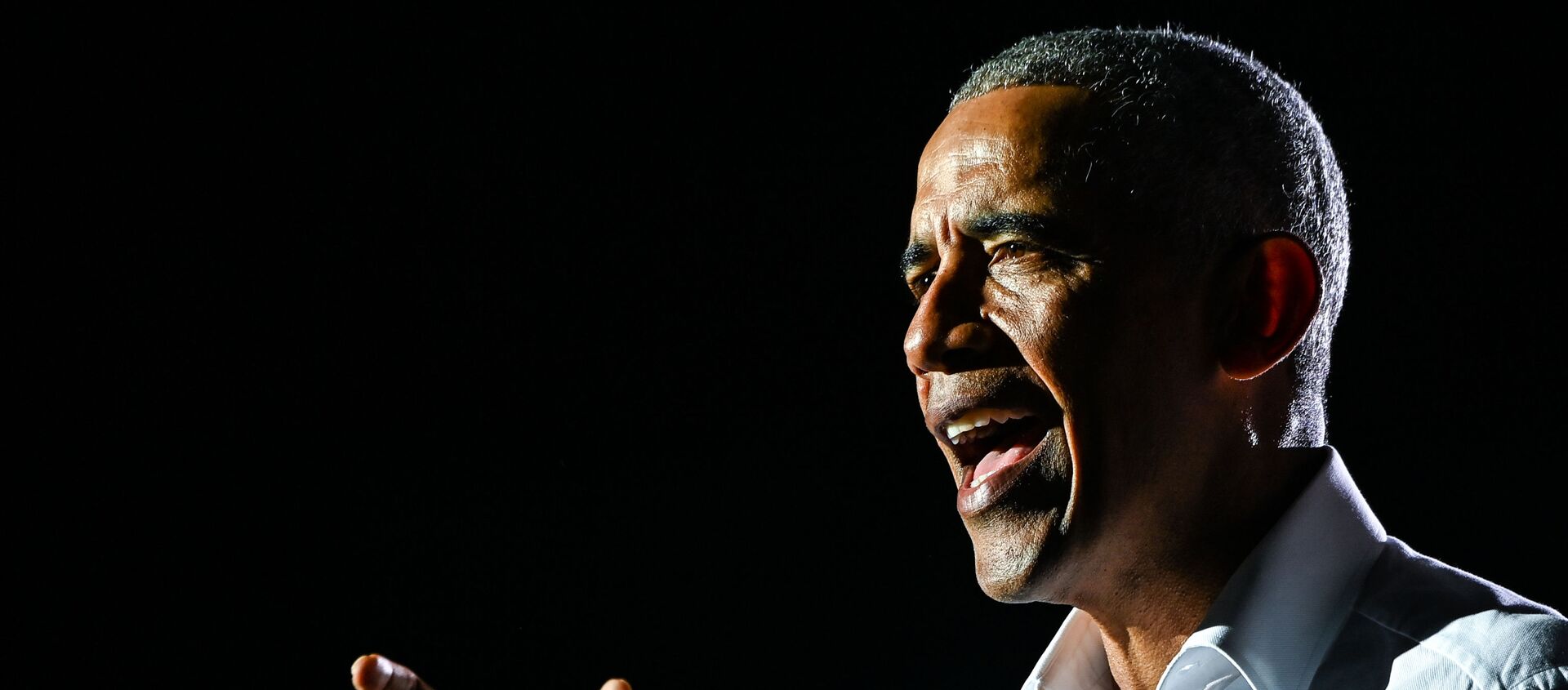 In this file photo taken on November 02, 2020, former US President Barack Obama speaks at a drive-in rally as he campaigns for Democratic presidential candidate former Vice President Joe Biden in Miami, Florida. - Obama says in his upcoming book that the divisions in America run deep and the departure of Donald Trump from the White House will not be enough to bridge the divide. In an excerpt from A Promised Land, which goes on sale on November 18, 2020, Obama reflects on the four years since he left office.  - Sputnik International, 1920, 17.11.2020