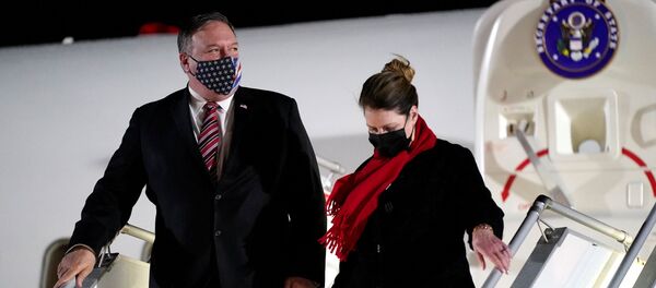 US Secretary of State Mike Pompeo and his wife Susan step off a plane at Tbilisi International Airport in Tbilisi, Georgia, November 17, 2020 - Sputnik International