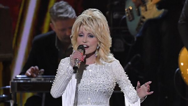 FILE - This Nov. 13, 2019 file photo shows Dolly Parton performing at the 53rd annual CMA Awards in Nashville, Tenn. - Sputnik International