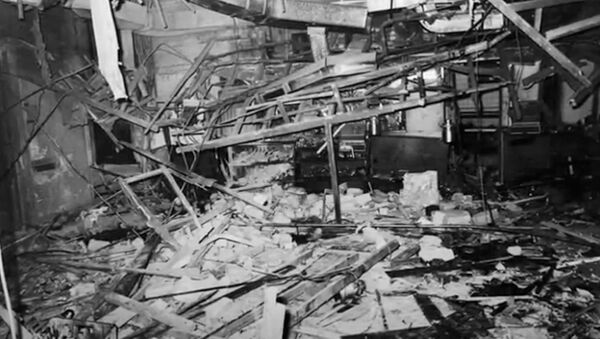 Screenshot captures wreckage from inside The Mulberry Bush pub, one of the two establishments which were bombed in Birmingham, England, in November 1974. - Sputnik International